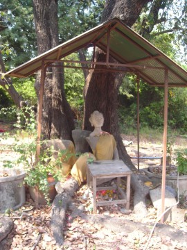 Broken Buddha image in situ