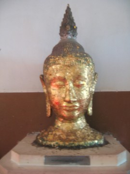 Buddha head excavated in situ and displayed in the vihara of Wat Mongkhon Bophit