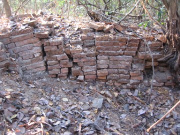 Likely remnants of the inner wall of the ubosot