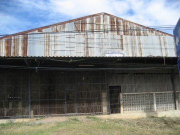 Warehouse with traces of Wat Yak within